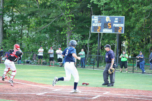 PLANTING his foot squarely on home plate, pinch runner Andrew Robins scores what would prove to be the game-winning run against Saugus after being driven home on a Tom Anastasi RBI in the bottom of the fifth to break a 2-2 tie. (Maureen Doherty Photo)