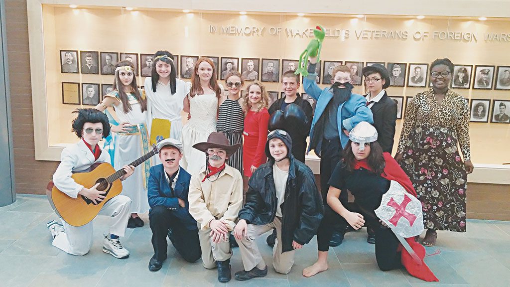 STUDENTS in grade 6 at the Galvin Middle School recently participated in the annual Wax Museum held in the school's new cafeteria. For the event, students in Mr. Boyd's Language Arts class dressed as someone famous and presented patrons with information on their lives. The occasion marked the culminating event of their biography research unit. This year's Wax Museum drew hundreds of students, teachers, administrators and parents from the school community. Front row, from left: Jared Green, Dan King, Alex Skeldon, Jason Hubbard and Priscilla DeSouza. Back row, from left: Hannah Hodzic, Maggie Ritchie, Erica Pecjo, Laura Sweeney, Leah Rossi, Zac Domey, Tim Sampson, Hannah Canavan and Yvalee Verna.