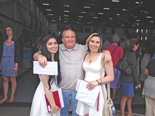 FRATERNAL twins Audrey McRae, left, and Nicole McRae are members of Wakefield Memorial High School’s Class of 2015. They are shown with “Uncle Dad” Andrew McRae. The twins’ father Robert McRae, now deceased, graduated from Wakefield’s high school in 1980. Andrew graduated in 1976.