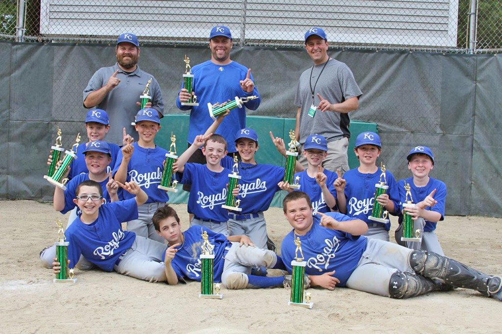 ROYALS NOT BLUE. The North Reading Little League Royals pose with their championship trophies after defeating the Angels on Saturday afternoon for the Majors title. The series, featuring the league’s top two teams from the regular season, went three games, with the Royals taking the decisive Game 3 by a 5-1 count. (Courtesy Photo)