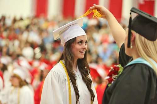 SHANNON GRADY has her mortarboard tassel flipped to the left during graduation exercises Saturday. (Donna Larsson Photo)
