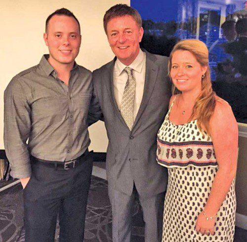 MIKE BOYAGES (center) is pictured with his son, Zack (left) and daughter, Caitlin (right), at his recent retirement party held at the Danversport Yacht Club. 