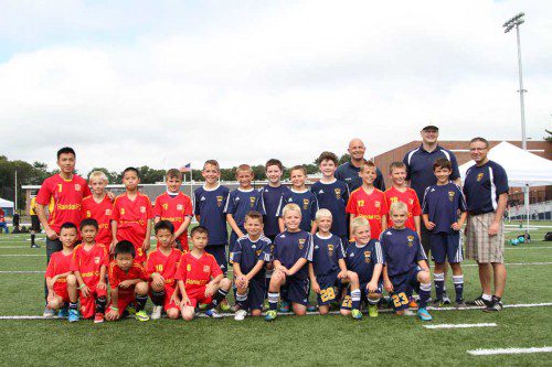 THE LYNNFIELD Avengers soccer team played host to the Shenzhen Randal FC of China in an international friendly U10 tournament last weekend. Four Lynnfield players volunteered to round out the Shenzhen roster. Front row, kneeling from left: China team members Sam, Harris, Leo, Alex and Harry; Lynnfield players Andrew Forcione, Drew Damiani, Christian Rosa, Dylan Damiani, Alex Gentile; back row, from left: Shenzhen coach Forest Lin, Henry Caulfield, Gary, Drew Von Jako, Rogan Cardinal, Brendan Powers, Kevin Connolly, Jack Calichman, Pearse MacDonald, Christian Murphy, Lucas Cook, Owen Klee, (rear): Avengers head coach Darren Damiani, assistant coaches Steven Connolly and David Forcione. (Donna Larsson Photo)