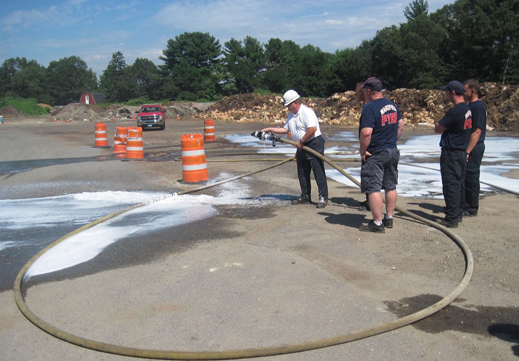 WAKEFIELD firefighters attended training yesterday at the Nahant Street Waste Facility on how to use foam to extinguish flammable liquids. (Gail Lowe Photo)