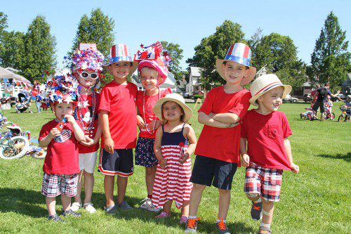 KIDS IN THE Stratford, Ogliba, Mirek and Schmitt families had a great time on the Common during Independence Day festivities July 3. (Donna Larsson Photo)