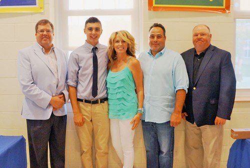 LYNNFIELD HIGH SCHOOL senior Nick Pascucci (second from left) was presented a $1,000 scholarship from Wakefield Co-operative Bank at the baseball team’s end of the season banquet recently. From left, Michael Wolnik, Wakefield Co-operative Bank President and CEO; Nick Pascucci, Susan Pascucci, Michael Pascucci and baseball head coach John O’Brien. (Courtesy Photo)
