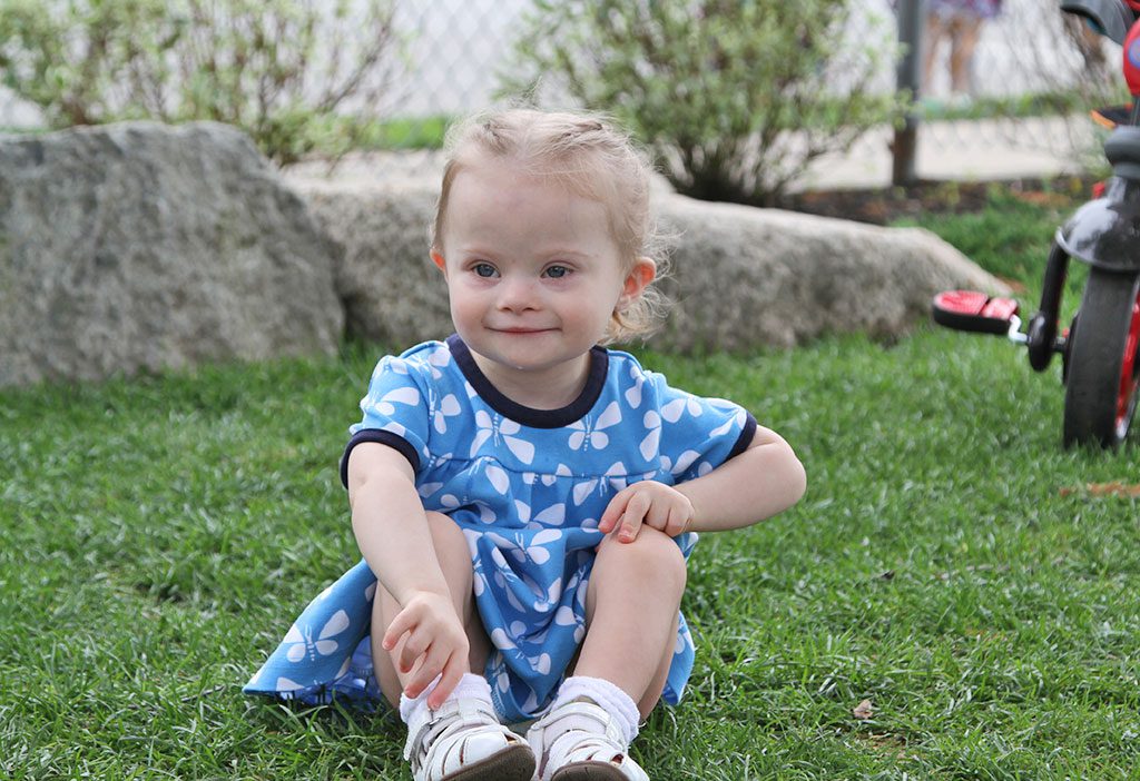 EIGHTEEN-MONTH-OLD Sadie Dunne relaxing at the Common one recent early summer day. (Donna Larsson Photo)