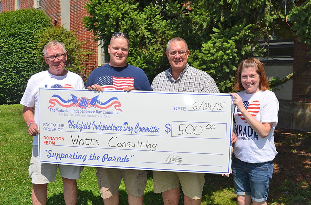 WATTS CONSULTING has contributed $500 to bring back Massachusetts’ largest 4th of July Parade, to be held Saturday in Wakefield. Pictured from the left are: Steve Gates, Paul Watts Jr., Paul Watts Sr. and Amy Braid.