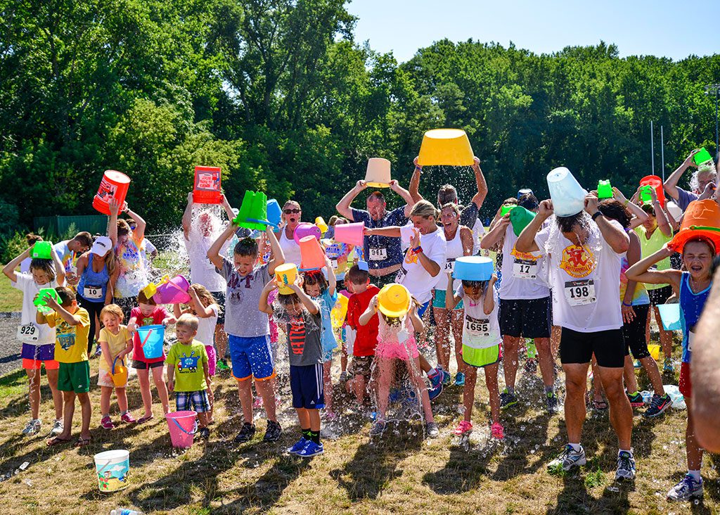 THE city held a community-wide ALS Ice Bucket Challenge at Pine Banks Park on Aug. 16 after a 5K race was held in memory of Mary O’Donnell, who died from ALS last year.  (Frank Goodhue Photo)
