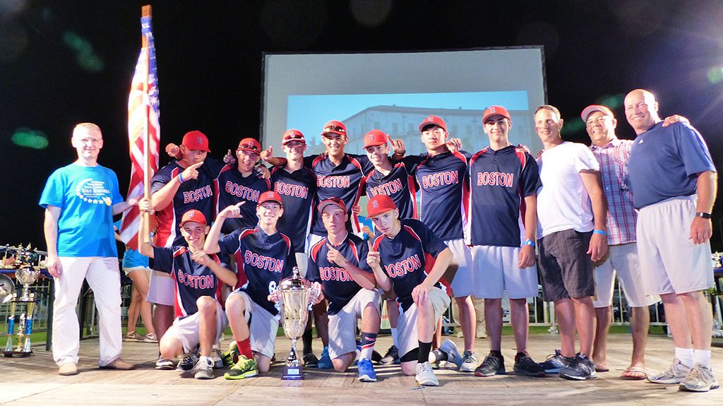 OUTSTANDING IN ITALY. North Reading residents played a big role in Team Boston’s championship performance at an international baseball tournament held earlier this month in Sala Baganza, Parma, Italy. The team, consisting of 13-16-year-olds from the area, went undefeated in its six games, capped by a 13-0 victory over host Salabaganza for the title. Front row (left to right): Marco Vittozzi (North Reading), Jake Berger (Boston), Mathew Corieri (North Reading), Greg Sawyer (North Reading); Back row: Salabaganza Tournament President, Andrew Mazzone (Belmont), Mitchel Schroeder (Brookline), Oliver Bergeron (Melrose), Aiden Park (Medford), Steve Rizzuto (Belmont), Jimin Kang (Winchester), Peter Demetri (North Reading), Coach James Demetri, Coach Vincent Bonanno, Head Coach Marco Vittozzi. (Courtesy Photo)
