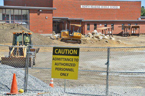 THE EVENTUAL DEMOLITION of the old North Reading High School is approaching and the entire area, including the former parking lot, is all blocked off. (Bob Turosz Photo)