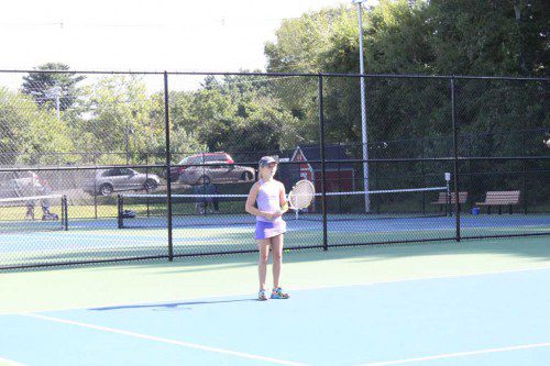 LAURA SWEENEY awaits the serve at the Walter Jr. Tennis Tournament which was held nearly two weekends ago at the Dobbins Courts. Sweeney was a Girls' 12 finalist.