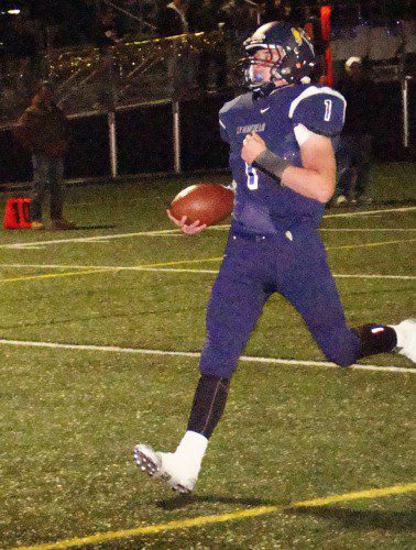 STRIDING into the LHS Century Club is captain Drew McCarthy (1) as he scored his second TD of the night and 102nd of his career against H-W Friday. (Tom Condardo Photo)