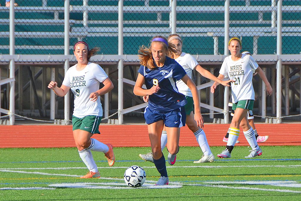 JUNIOR Liz Reed (9) scored two goals during the Pioneers’ 3-2 victory over Triton Oct. 13. She also scored a goal during the Pioneers’ 2-2 tie against Pentucket on Oct. 15. (John Friberg Photo)