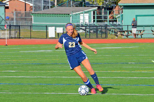 JUNIOR FORWARD Liz Reed (9) guided the Pioneers to two victories last week. Reed scored the Pioneers’ only goal during the locals’ 1-0 victory over Manchester-Essex Oct. 6. She also scored a goal during Lynnfield’s 5-1 victory over Georgetown Oct. 9. (John Friberg Photo)