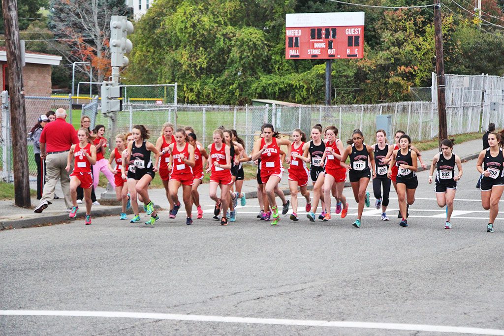 THE WARRIOR girls' cross country team as a whole ran terrific and posted personal best times in its meet against Watertown at the Beasley Track and Field Course at Wakefield Memorial High School. The Warriors won 20-43 to win their fifth straight league title.