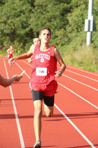 RICH CUSTODIO, a senior, came in fifth overall in a time of 16:59 in Wakefield's 25-34 win over Watertown yesterday afternoon at the Beasley Track and Field Course at WMHS. (Donna Larsson File Photo)