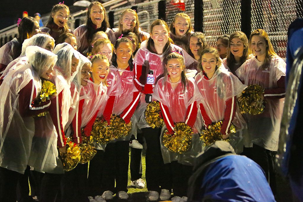 MEMBERS OF the MHS cheerleading team were on hand for the live pre-game broadcast from Fox 25 News Boston, who landed in Melrose last Friday night at Fred Green Field to cover the Melrose vs. Watertown game, which served as the station’s Game of the Week. Both Melrose and Watertown were undefeated teams going into the contest at 3-0 but only Melrose holds that distinction now, beating the Raiders 28-7 to remain 4-0 this season. For more on the game see our Sport section. (Donna Larsson photo)