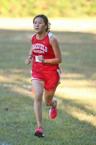 AMANDA WESTLAKE, a freshman, captured third place with a personal best time of 21:45 in Wakefield's meet yesterday against Burlington. (Donna Larsson File Photo)