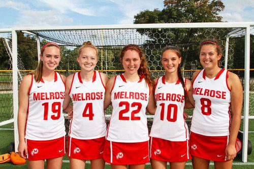 SENIOR MEMBERS of the Melrose Lady Raider field hockey team were honored on Senior Night on October 23 before their 4-1 win over Stoneham. Honored were (from left): Haley Maté, Emily Donovan, Maura Pelrine, Lindsey Chase, and Jessica Doherty. (Donna Larsson photo) 