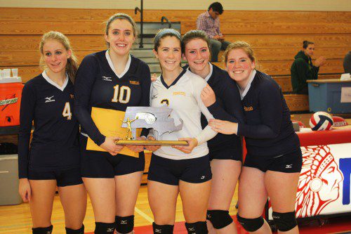 SENIORS, from left, Kaitlin Flannery, captain Mary Kate Deighan, captain Jess Dwyer, Jessica Morelli and Shannon Ryan proudly display the Division 3 North championship trophy after the volleyball team defeated Austin Prep 3-0 in the finals at Tewksbury Memorial High School Nov. 14. The Pioneers have won six straight D-3 North sectional titles. (Dan Tomasello Photo)