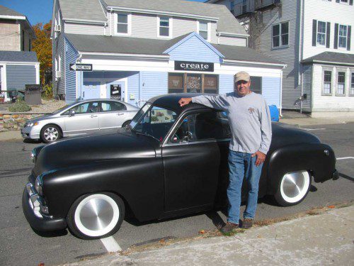 WATER STREET’S Steve Ulwick and his “new” 1950 Plymouth coupe and the one he had fifty years ago. (Mark Sardella Photo)