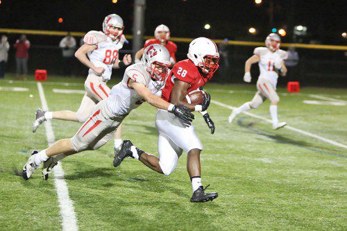THERE WAS no stopping Melrose running back Jay Tyler, who helped the Red Raider football team defeat Wakefield, 21-0 last Friday night in opening round playoff action. Tonight, Melrose will host Wayland at 7:00 p.m. 