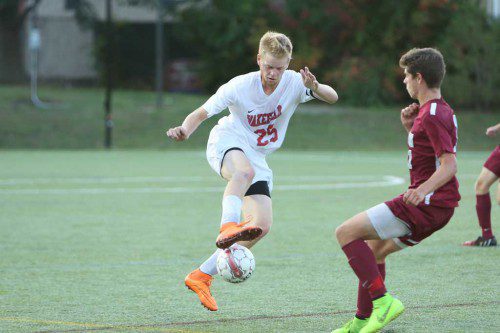 ANDREW AULD, a senior captain, led the Warrior defense which put the clamps on Tewksbury’s offense yesterday in the Div. 3 North semifinals. Wakefield won by a 2-0 score. (Donna Larsson File Photo)