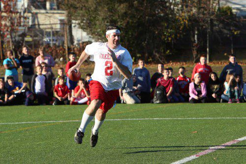 SIXTH GRADE teacher Matthew Gordon gets up a full head of steam during Friday’s Galvin Turkey Bowl. (Donna Larsson Photo)