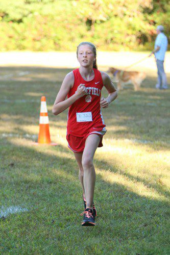 JORDAN STACKHOUSE, a junior, won a medal in the girls' varsity race by finishing 19th overall in a time of 16:20.0 in the Middlesex League Championship on Monday at the Woburn Country Club. (Donna Larsson File Photo)