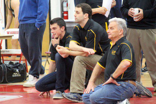 LYNNFIELD-NORTH READING co-op wrestling head coach Craig Stone (at right) recently celebrated his 500th career wrestling victory with assistant coaches Matt Goodwin (left) and Nick Secatore. (Courtesy Photo)