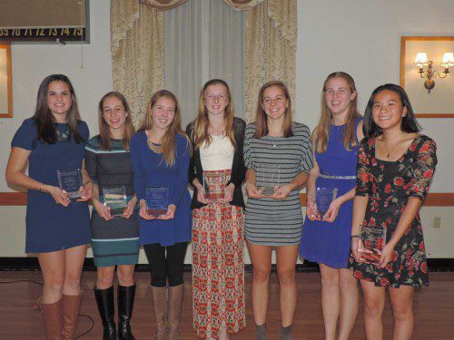 THE WMHS girls’ cross country team honored the 2015 season and gave out several awards. From left to right are senior Sara Custodio (“No Guts, No Glory” Award), junior Abby Harrington (Unsung Hero Award), senior Reilly McNamara (Outstanding Captain Award), junior Jordan Stackhouse (Top Runner Award), junior Cassie Lucci (Coach’s Award), sophomore Gillian Russell (Lady Wolverine Award) and freshman Amanda Westlake (Rookie of the Year Award).