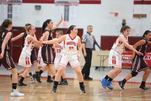 GABBY JOLY, a senior (#12), had four points against Cathedral, while teammates Grace Hurley (#15) recorded three points and Olivia Dziadyk (#23) netted seven points. Wakefield lost the non-league game, 50-35. (Donna Larsson File Photo)