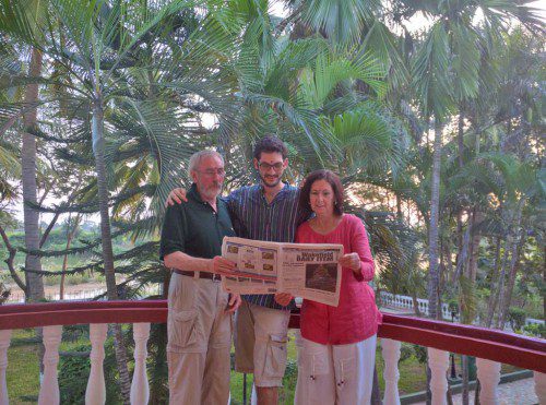 THE NESTER FAMILY spent the Christmas holiday in south India this year. The area they visited is famous for spices and rice paddies along with world famous temples. From the left, Michael, Hayden and Linell Nester catch up on some news from back home.