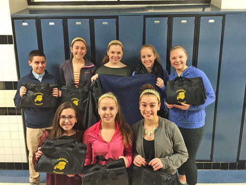 THE FRESHMAN class at LHS wants everyone to show their "Pioneer Pride" by ordering their blankets with the Pioneer logo. Class of 2019 members proudly displaying the blankets are kneeling (from left): Grace Sokop, Brianna Barrett and Gabriella Passatempo; standing (from left): Joe Fabrizio, Willa MacLennan, Barbara Dickey, Ashley Barrett and Emily Dickey. (Courtesy Photo)