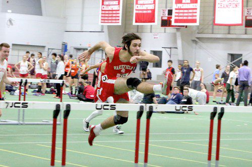 ZACH CONLON, a senior, won the 55 meter hurdles in a time of 9.42 seconds in Wakefield’s victory over Stoneham last night at Boston University. (Donna Larsson Photo)