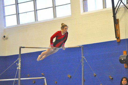 ALYSSA VACCA, a sophomore, returns to compete on bars, floor and vault for the Warrior girls’ gymnastics team this winter.
