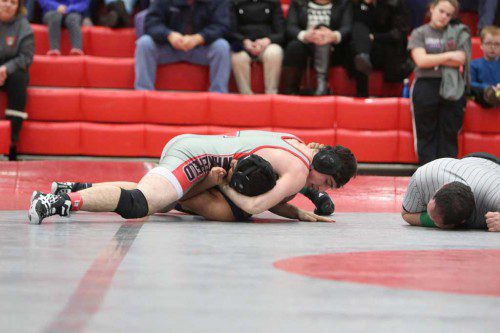 JOE MARINACCIO, a junior (top), earned a key victory as he won by pin at the 160 weight class in Wakefield’s 48-34 triumph over Burlington last night in a Middlesex League Freedom division contest at Burlington High School. (Donna Larsson File Photo)