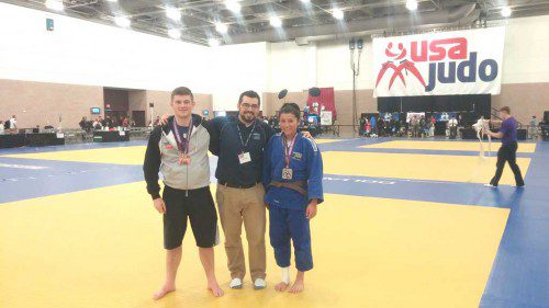 MEDALISTS John Silva (left) and Casey Pedro (right) are pictured with Pedro’s Judo Center Manager Riley McIlwain. Silva won a bronze medal and Pedro was awarded a silver medal at the Junior Nationals. 