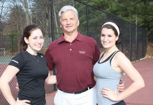 THE girls’ tennis team will be led by, from left, senior captain Amanda Stelman, head coach Craig Stone and senior captain Olivia Skelley this spring. (Dan Tomasello Photo)