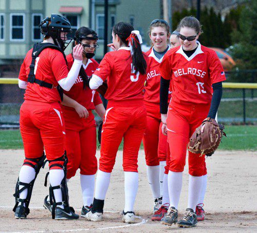 THE MELROSE High girls softball team are all smiles after back-to-back wins this week. (Steve Karampalas photo)