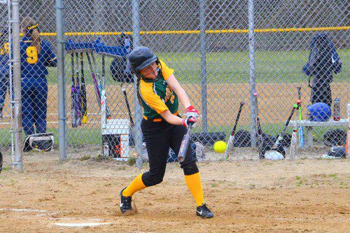 HORNET SENIOR Sarah Sabella is all over this pitch, which she whacks up the middle for a base hit. (John Friberg Photo)