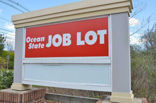 IT'S COMING. This sign on Winter St. across from St. Theresa Church proclaims the arrival of Ocean State Job Lot. (Bob Turosz Photo)
