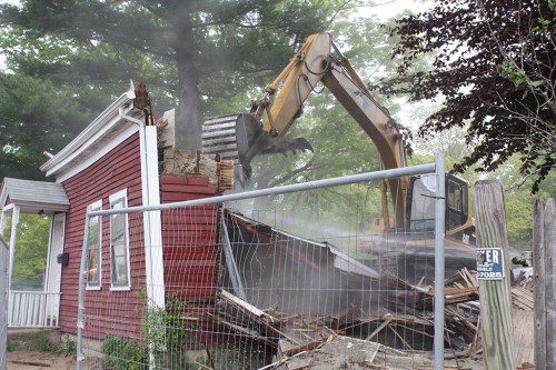 THIS home at 509 North Ave. was razed Tuesday in order to create more burial plots at Lakeside Cemetery. The home was built in the 1830s.  (Dan Tomasello Photo)