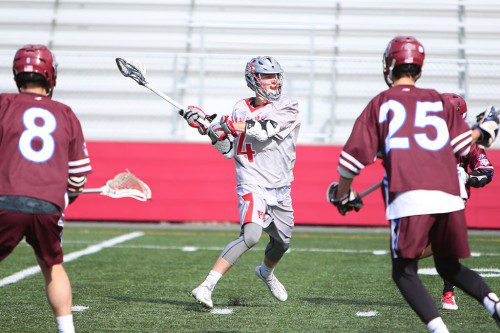 AUSTIN COLLARD, a junior midfielder (#4), tallied three goals and assisted on eight others as the WMHS boys’ lacrosse team rolled to a 17-2 victory over Belmont on Friday afternoon at Landrigan Field. (Donna Larsson Photo)