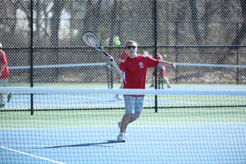 MATT HOENIG, a senior, played at first doubles with freshman Jon Stumpf and the Warrior duo cruised to a 6-1, 6-1 triumph in the season finale against Watertown. The Warriors won the match, 4-1. (Donna Larsson File Photo)