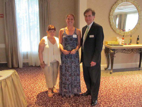 KATHRYN PRICE (center), owner of Curious Kids in Lynnfield, was presented the “New Business of the Year” award for Lynnfield at the annual meeting and dinner of the Wakefield Lynnfield Chamber of Commerce June 7 at Spinelli’s. Price is shown with Chamber co-Presidents Cheryl Carroll and attorney Thomas Mullen. (Gail Lowe Photo)