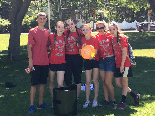 THIS GROUP OF Galvin Middle School eighth graders takes a break from a hard-fought game of Kan Jam during the 2016 Chaos on the Common "moving on" event yesterday. (Karen Pugsley Photo)