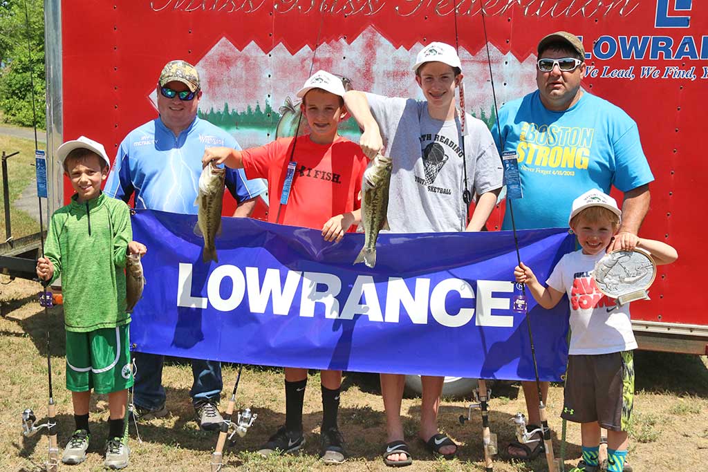 WINNERS of the 19th annual Martins Pond free children’s fishing derby had a lot to show for their efforts this year. From left: Jason Piscatelli, Jay McNulty, Vice President and Treasurer of the Wildside Bass Club, Maguire Koepke, Garrett Butler, Peter McLellan, President of the Wildside Bass Club and Aidan Sullivan. Read more in today’s Sports. (Lori Lynes Photo)