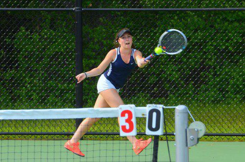 CAL Player of the Year Sarah Mezini cruised past Lowell Catholic senior Maggie Barrows in two sets during first singles, 6-1, 6-0, during the Pioneers’ 5-0 win over the Crusaders during the Division 3 North quarterfinals June 4. (John Friberg Photo)